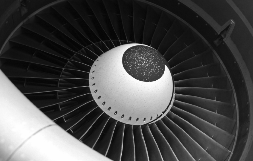 close up of a plane engine turbine